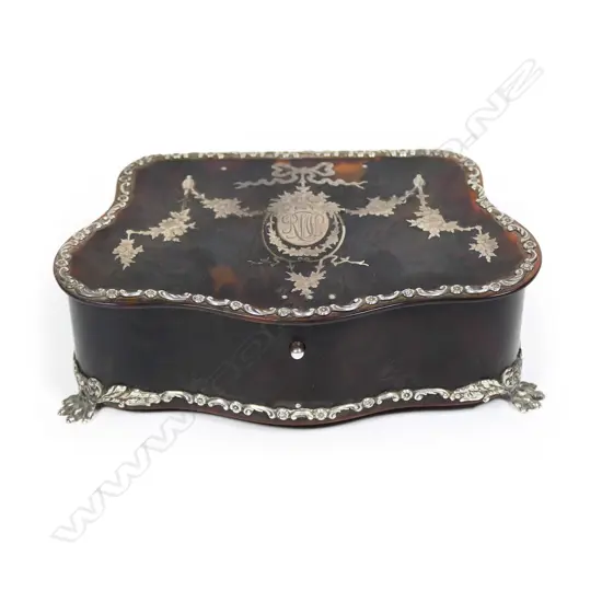 An Edwardian tortoiseshell and silver trinket box