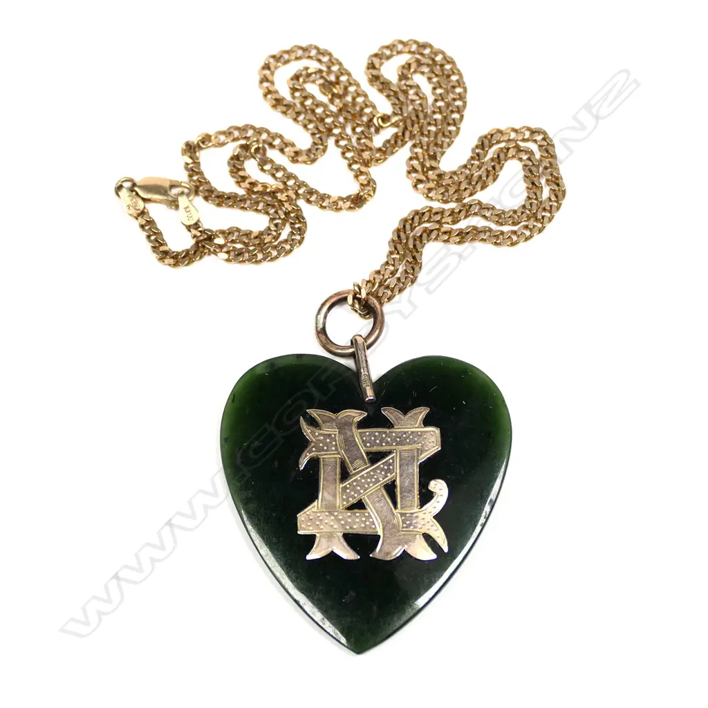 A 9ct yellow gold chain with colonial pounamu and 9ct heart pendant Image 1++