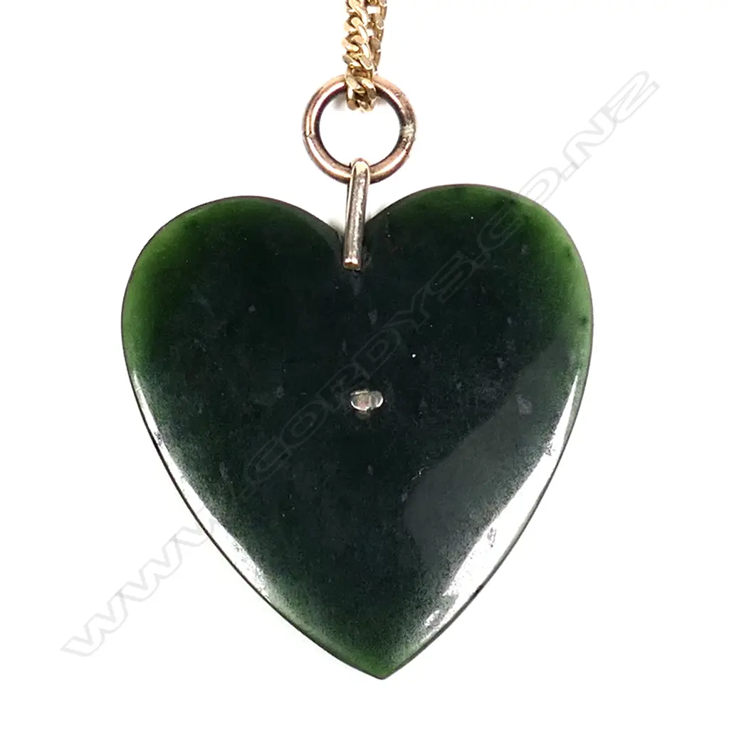 A 9ct yellow gold chain with colonial pounamu and 9ct heart pendant Image 1++
