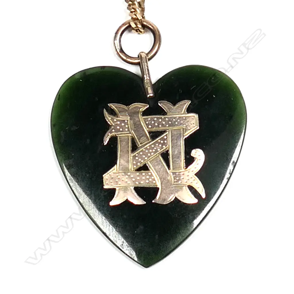 A 9ct yellow gold chain with colonial pounamu and 9ct heart pendant Image 1++