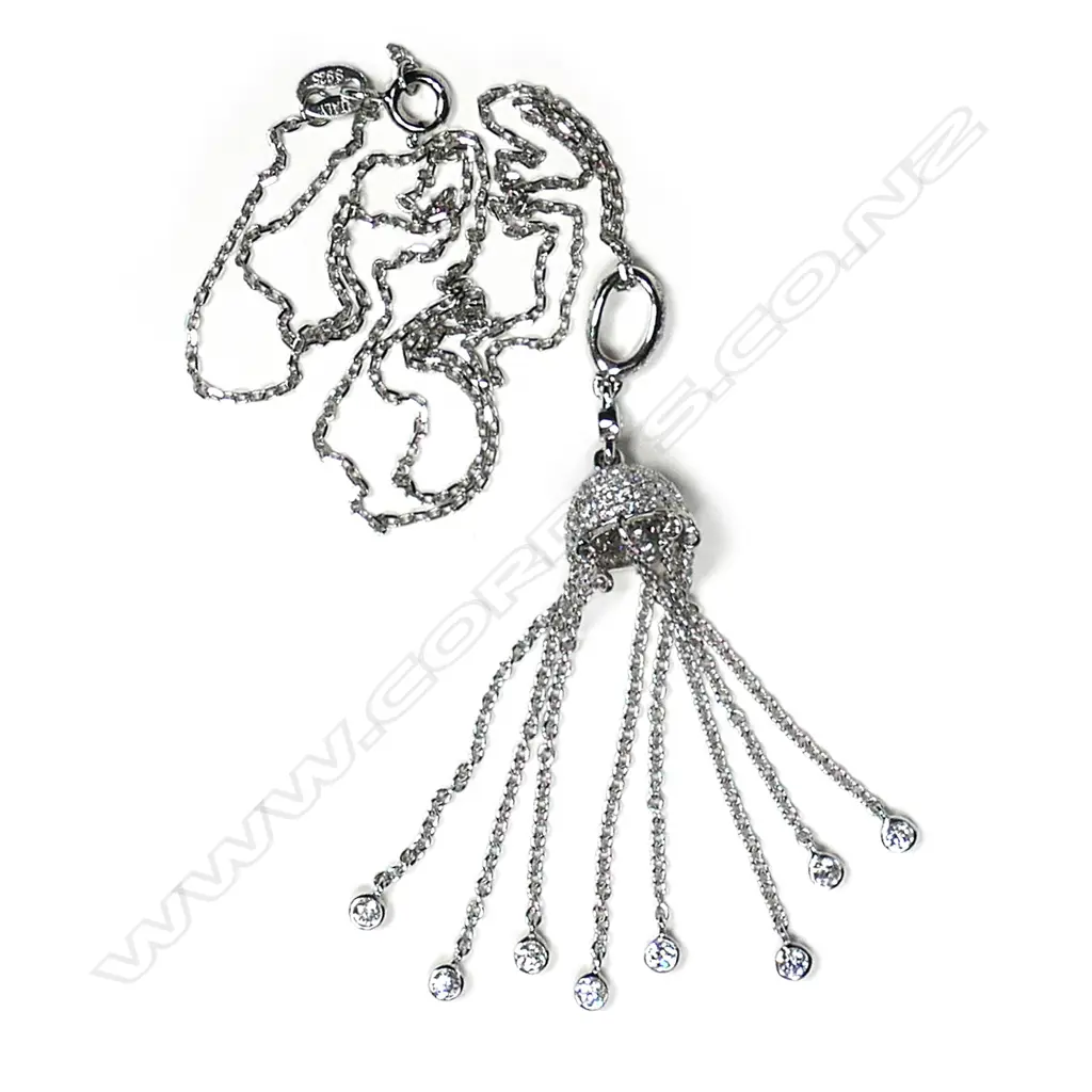 An 18ct white gold and diamond jelly-fish type pendant on chain Image 1++