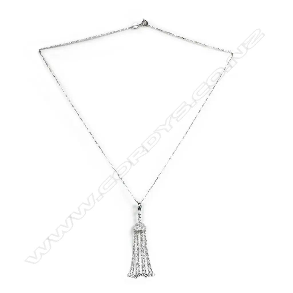An 18ct white gold and diamond jelly-fish type pendant on chain Image 1++