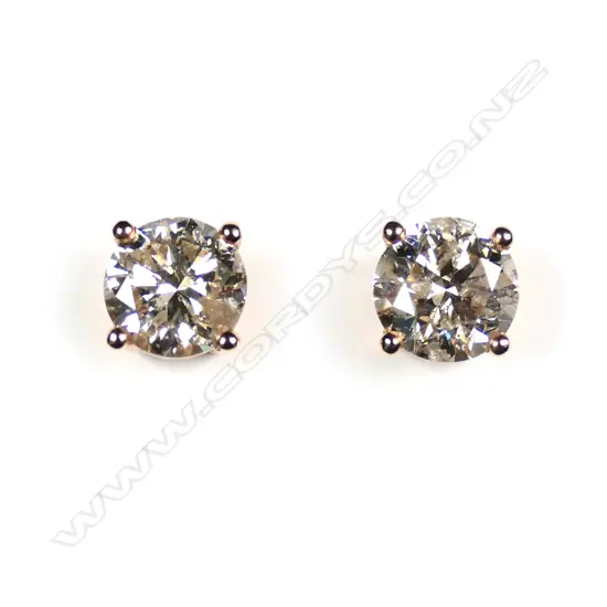 A pair of 14ct rose gold diamond stud earrings