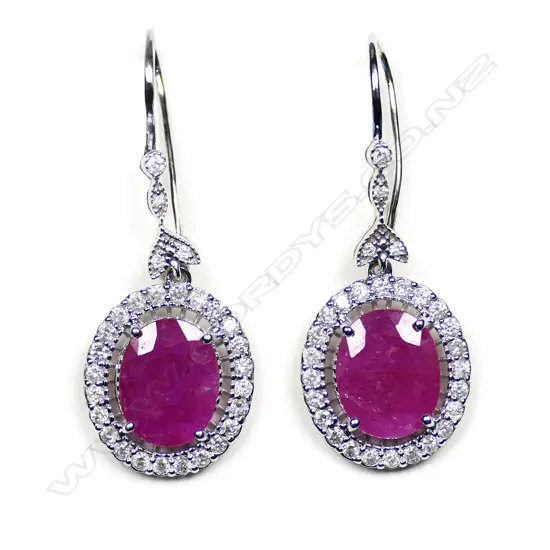 A pair of 14ct white gold ruby and diamond antique style drop earrings
