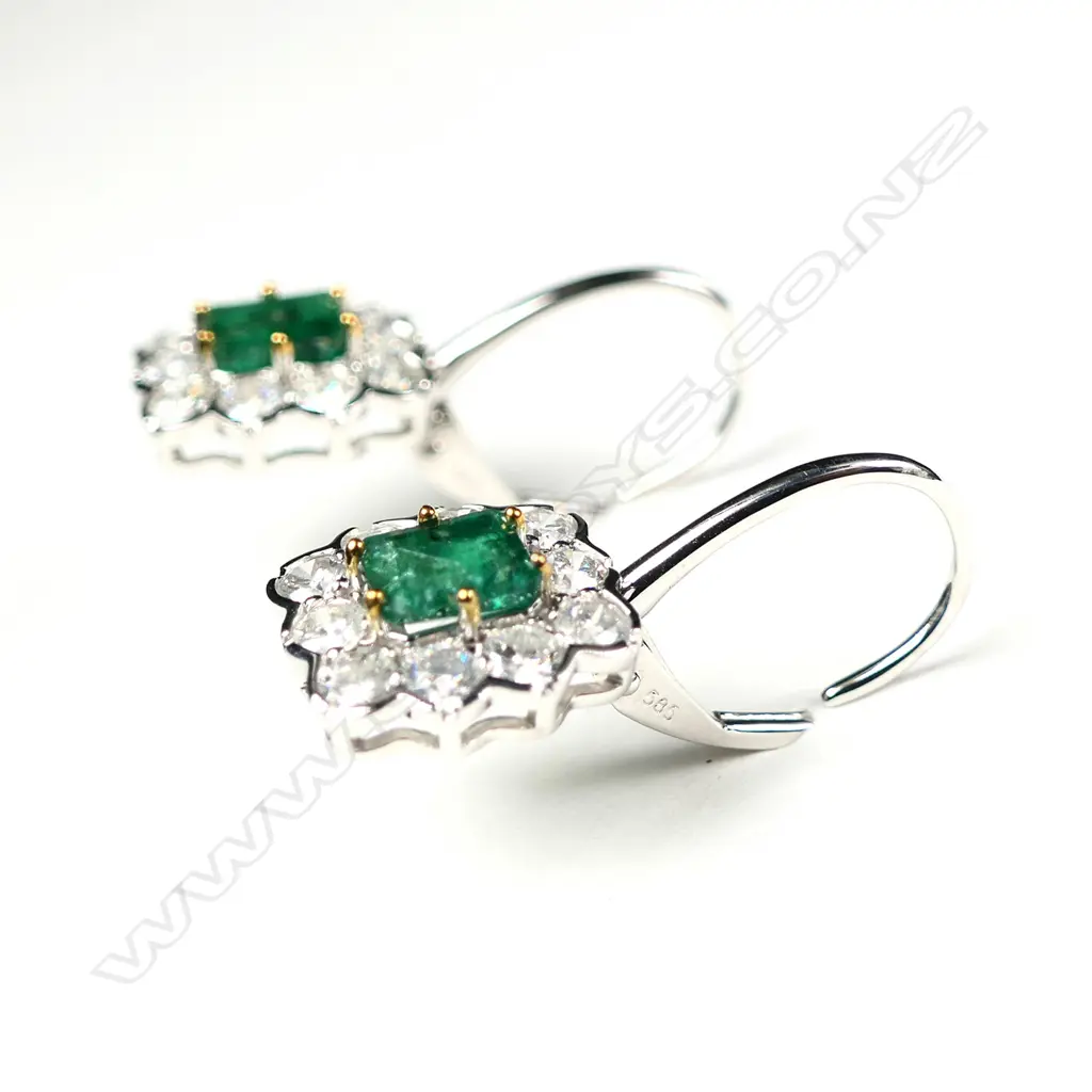A pair of 14ct white gold emerald and diamond antique style earrings Image 1++