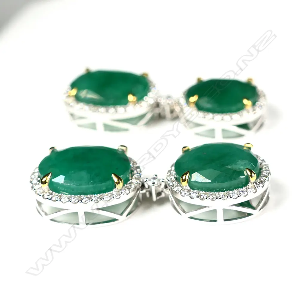 A pair of 14ct white gold Zambian emerald and diamond double drop earrings Image 1++