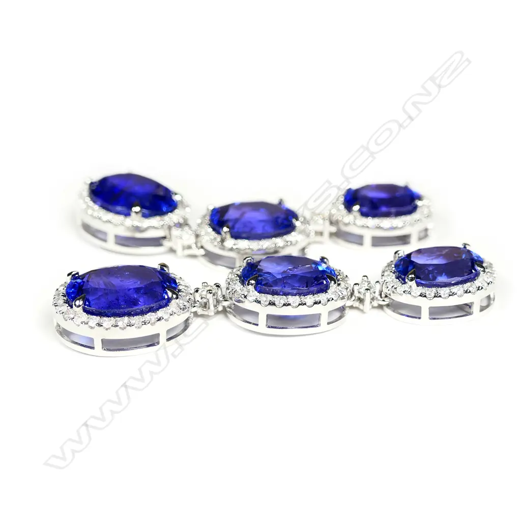 A pair of 14ct white gold tanzanite and diamond Image 1++