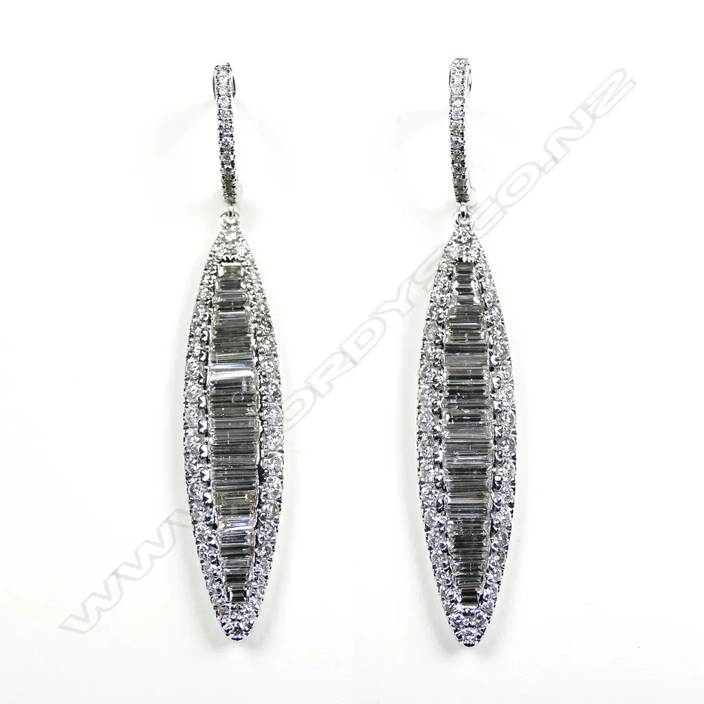A pair of 18ct white gold and diamond earrings Image 1++