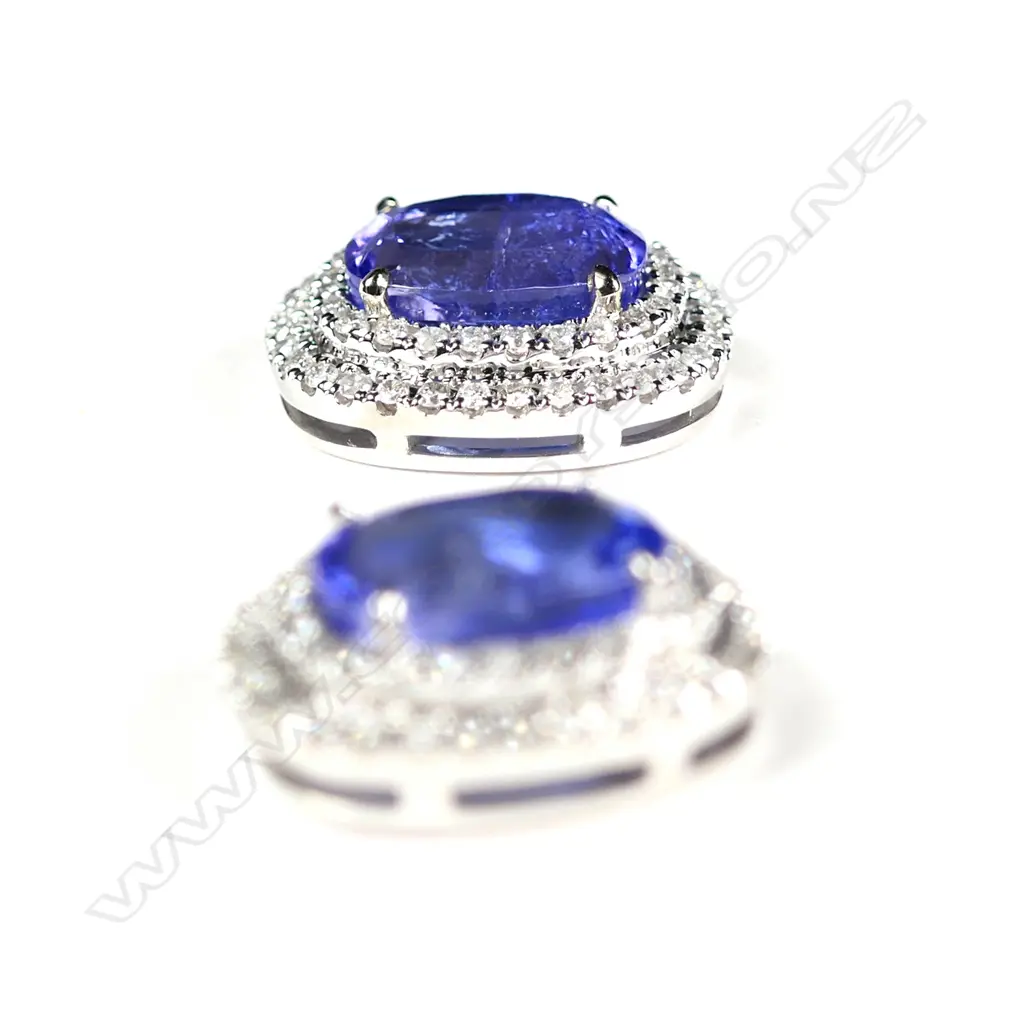 A pair of 14ct white gold tanzanite and diamond double halo stud earrings Image 1++