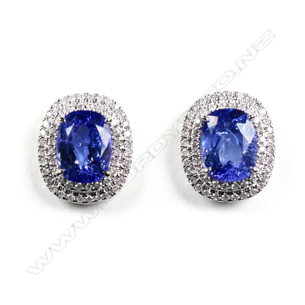 A pair of 14ct white gold tanzanite and diamond double halo stud earrings Image 1++
