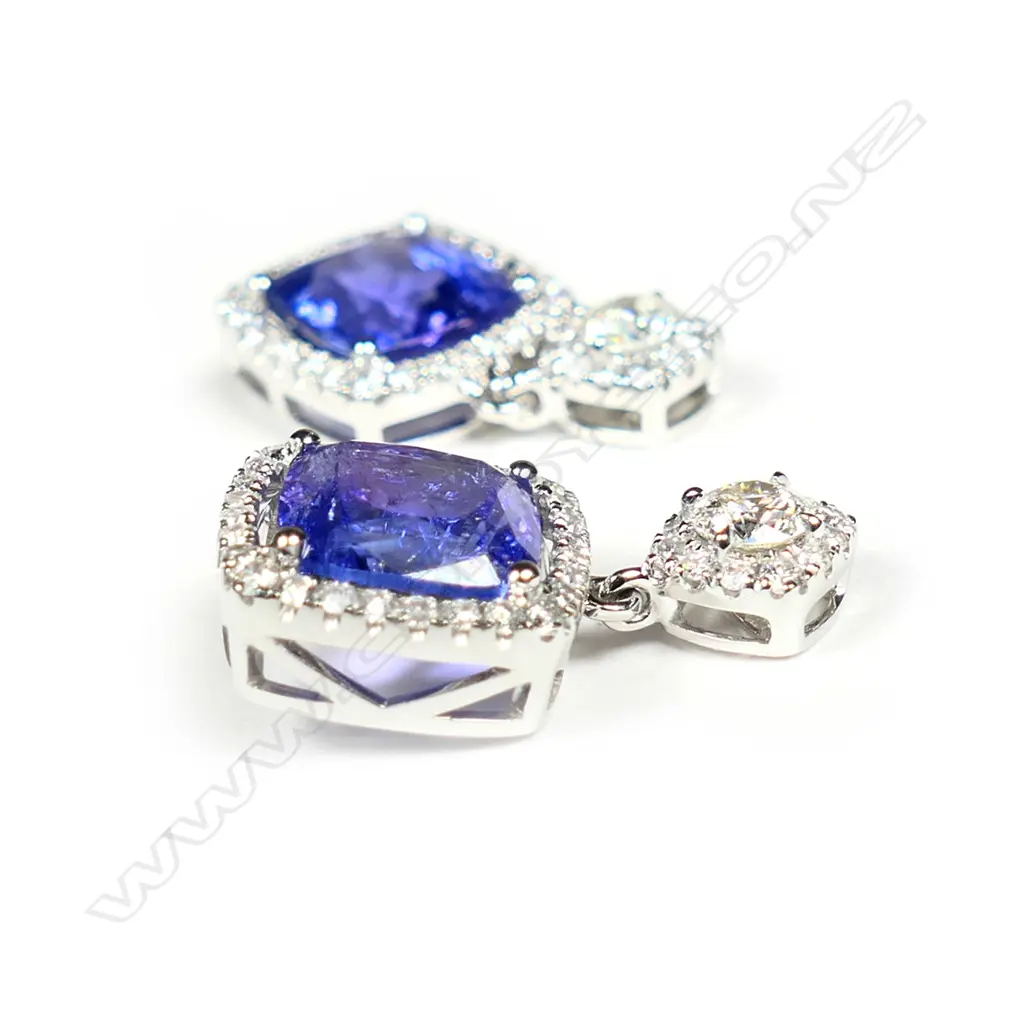 A pair of 14ct white gold tanzanite and diamond antique style drop earrings Image 1++