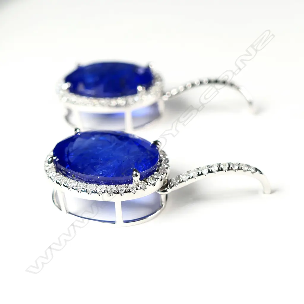 A pair of 14ct white gold tanzanite and diamond earrings Image 1++