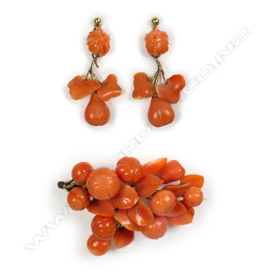 An early 20thC orange Mediterranean coral and 9ct gold brooch and earring set