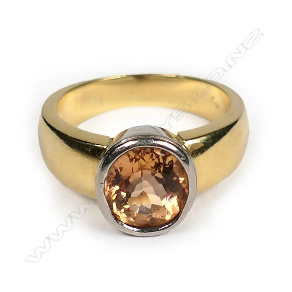 A modern design 18ct yellow gold golden sapphire ring Image 1++