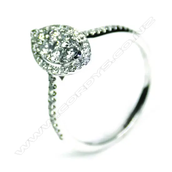 An 18ct white gold and diamond oval cluster ring
