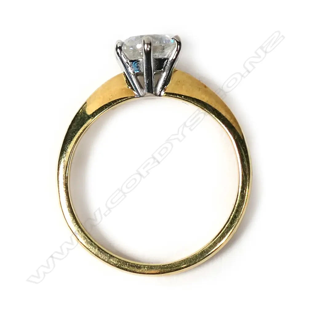 An 18ct gold and diamond solitaire ring Image 1++