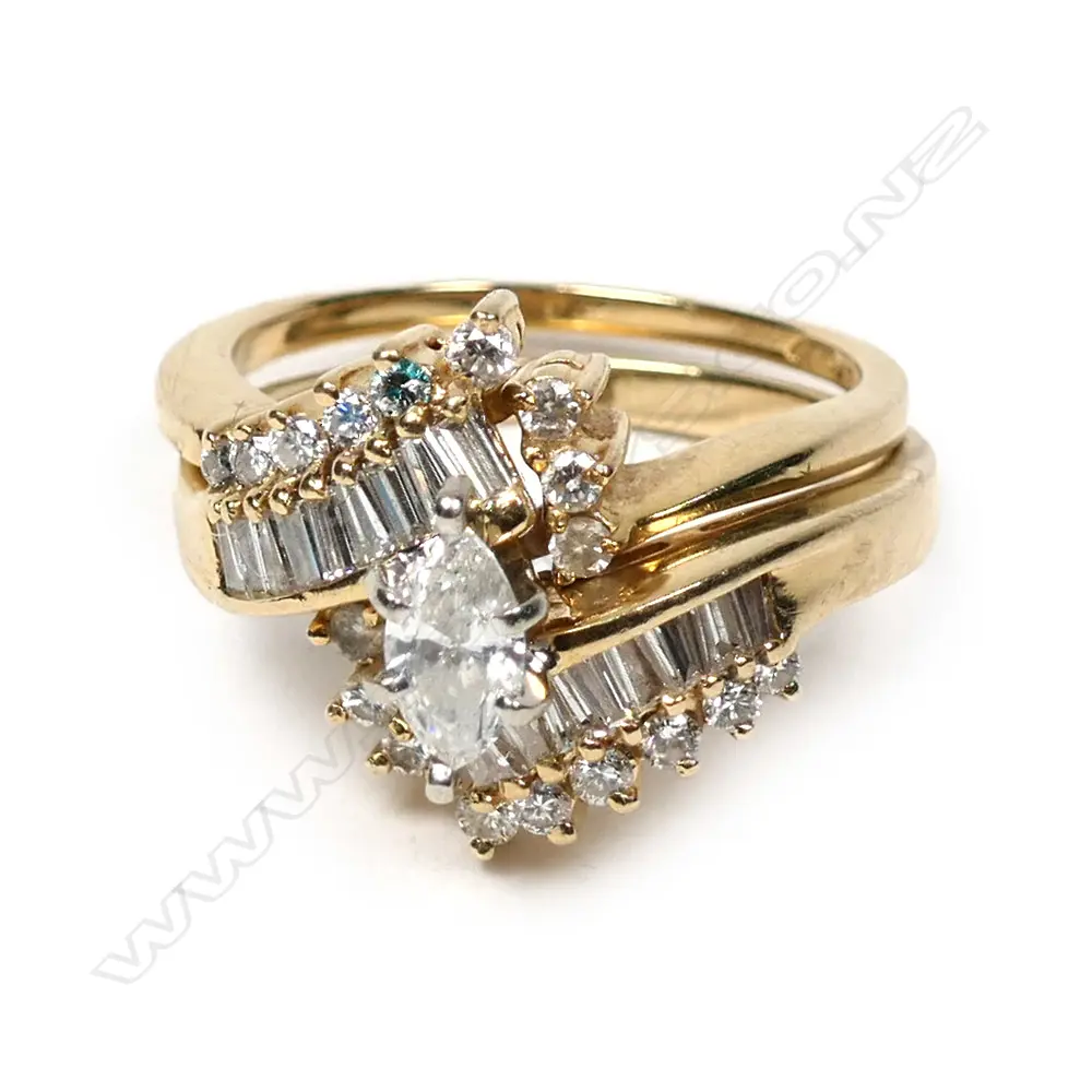 A suite of 14ct gold and diamond interlocking rings Image 1++