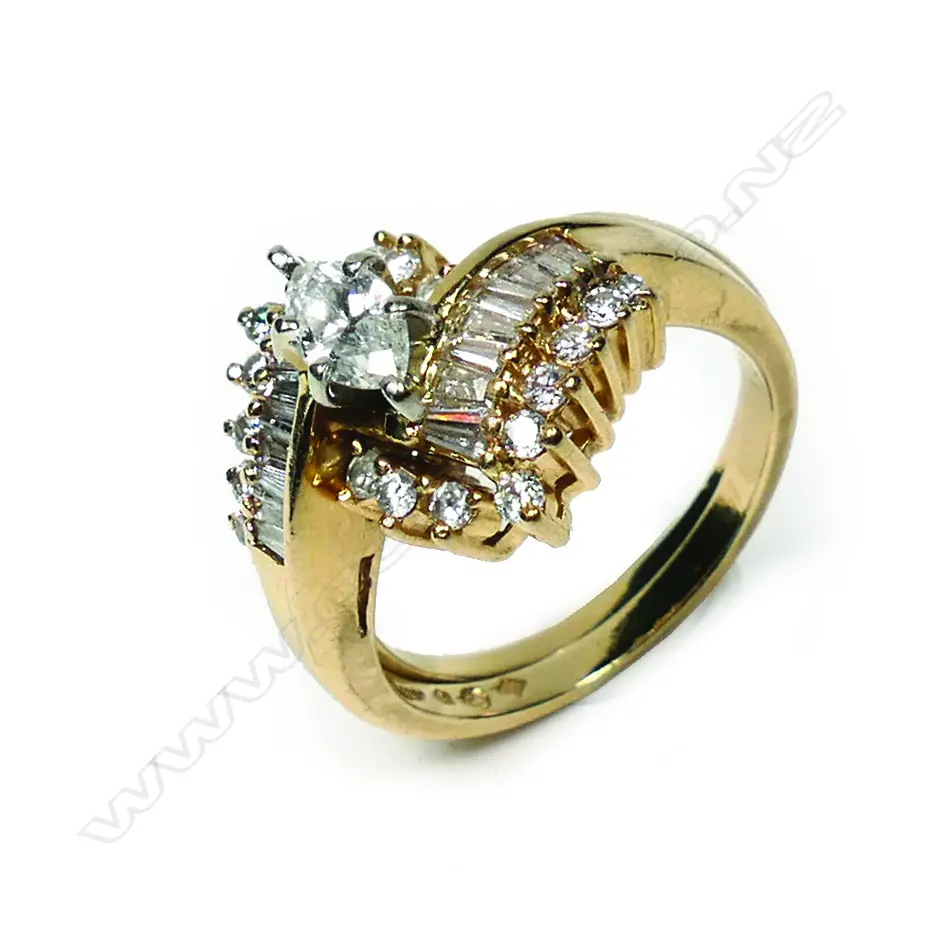 A suite of 14ct gold and diamond interlocking rings Image 1++
