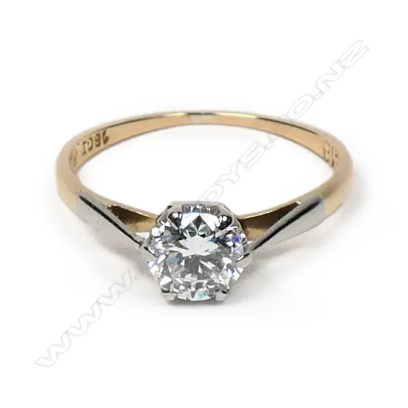 An estate 18ct gold and diamond solitaire ring Image 1++