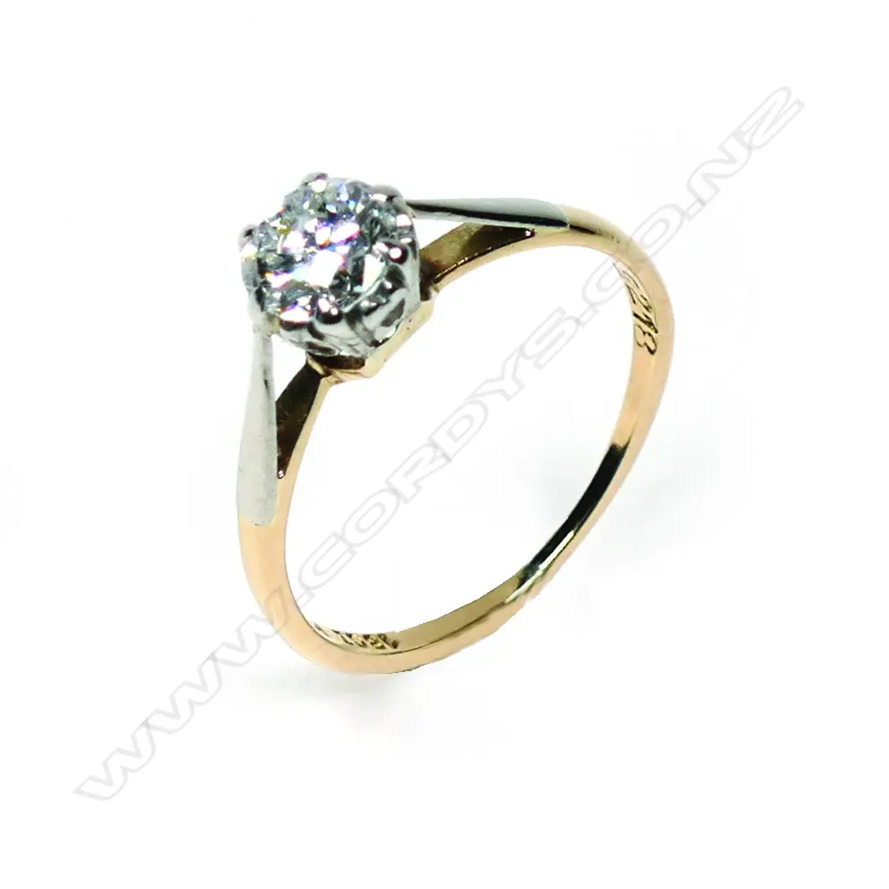 An estate 18ct gold and diamond solitaire ring Image 1++