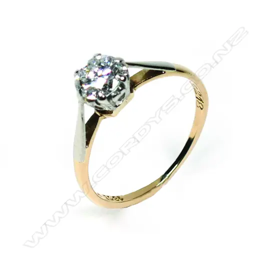 An estate 18ct gold and diamond solitaire ring