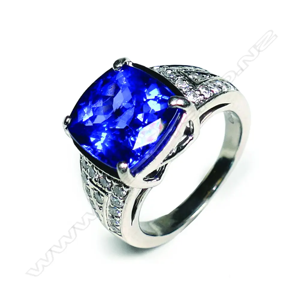 A platinum tanzanite and diamond dress ring Image 1++