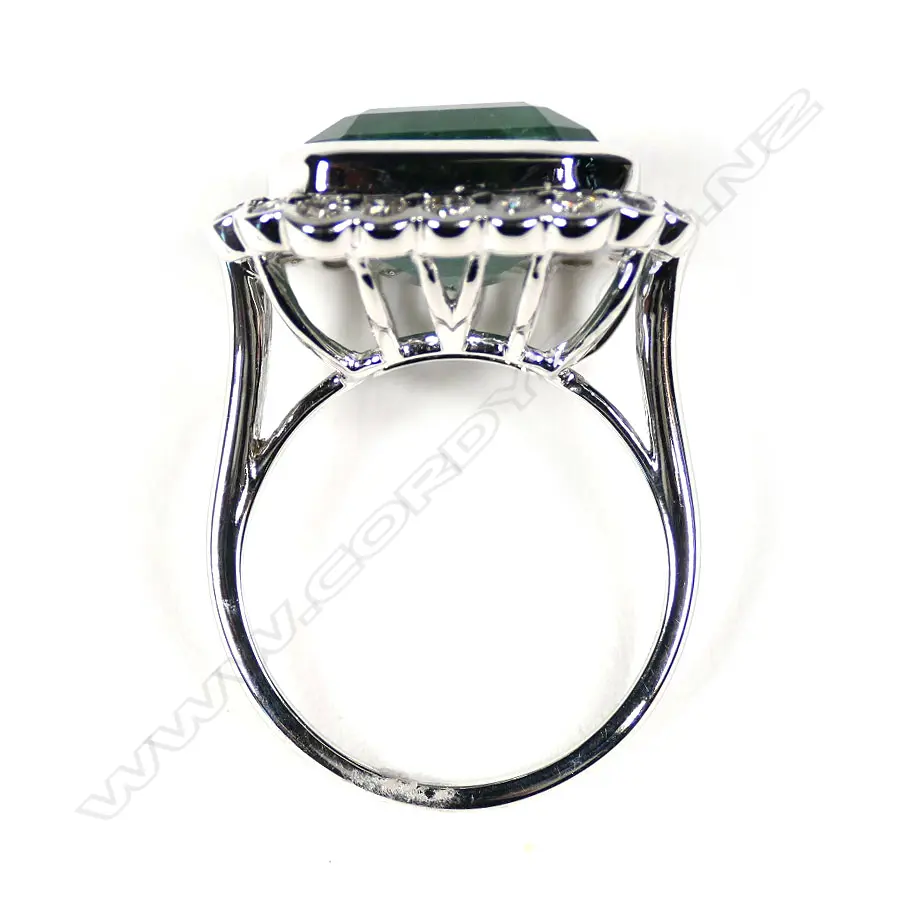 A 14ct white gold emerald and diamond cocktail ring Image 1++