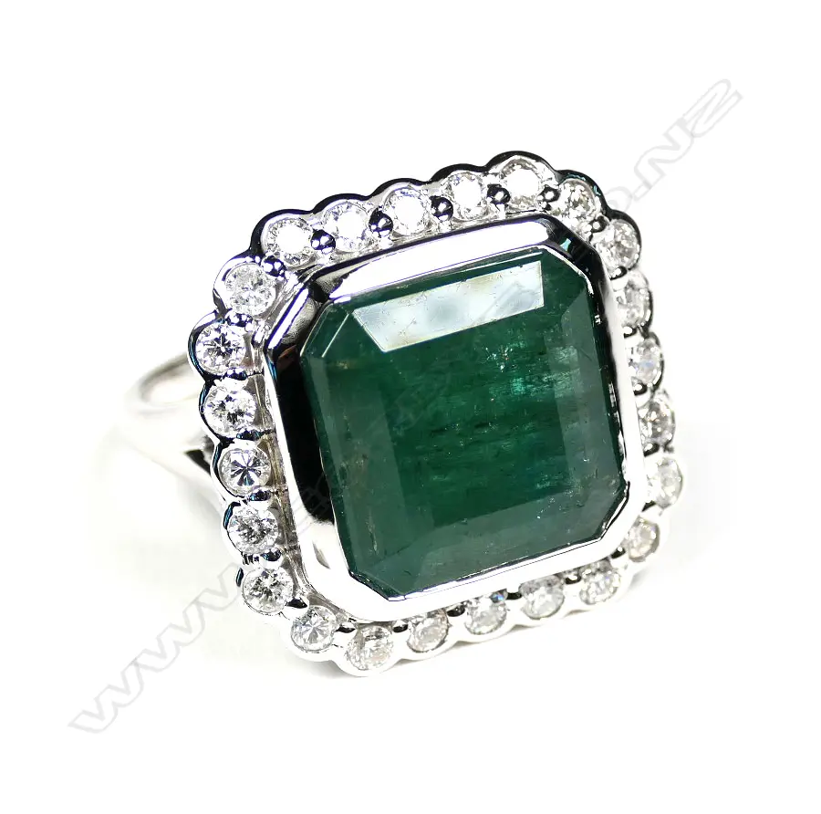 A 14ct white gold emerald and diamond cocktail ring Image 1++