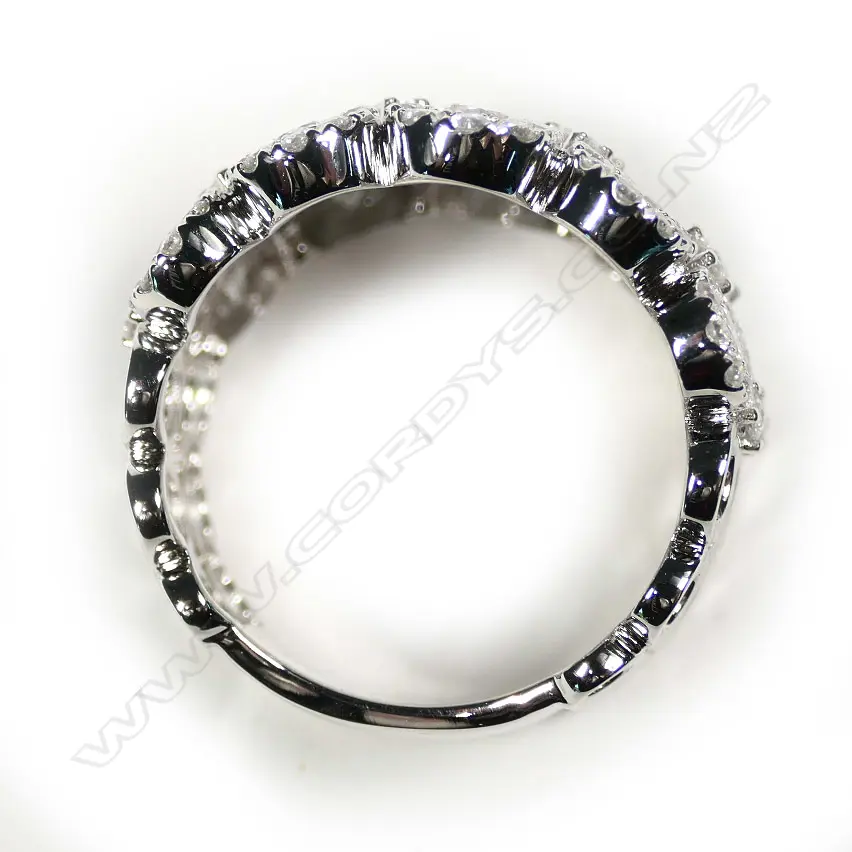 An impressive wide modern 18ct white gold and multi diamond ring Image 1++