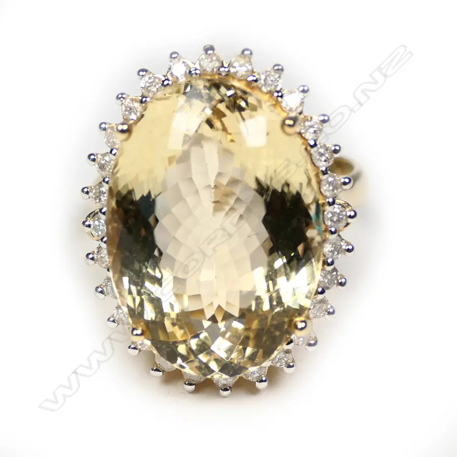 A 14ct gold heliodor and diamond cocktail ring Image 1++