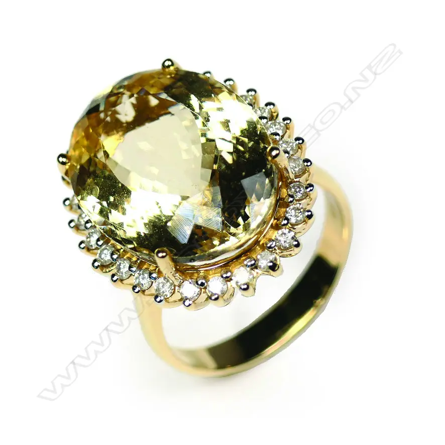 A 14ct gold heliodor and diamond cocktail ring Image 1++
