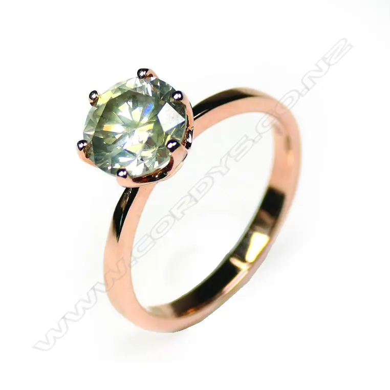 A 14ct rose gold light yellow diamond solitaire ring Image 1++