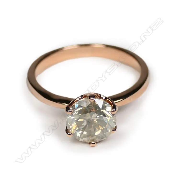 A 14ct rose gold light yellow diamond solitaire ring Image 1++