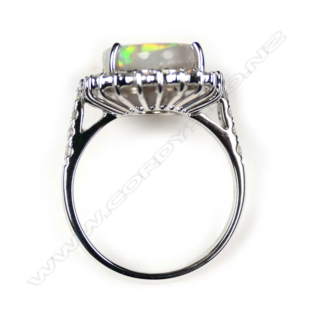 A 14ct white gold opal and diamond cocktail ring Image 1++