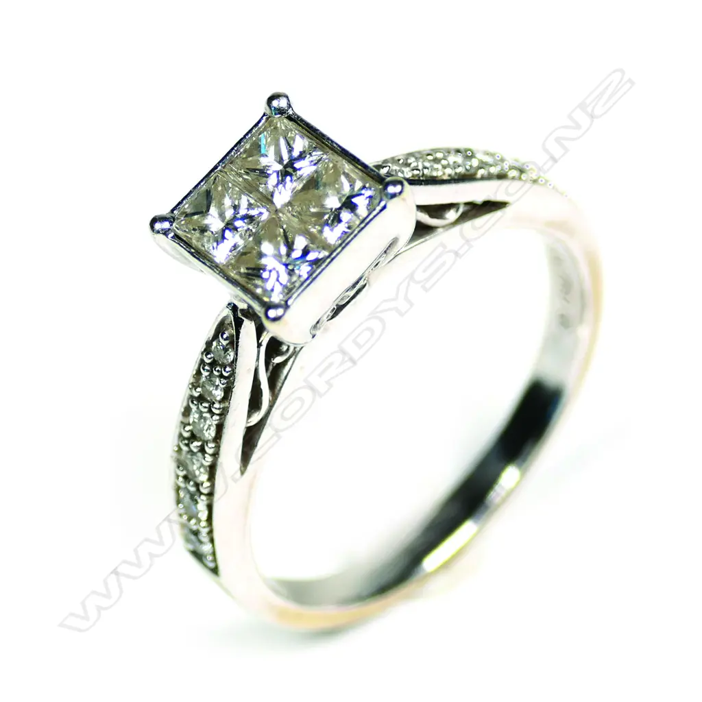 An 18ct white gold and diamond dress ring Image 1++