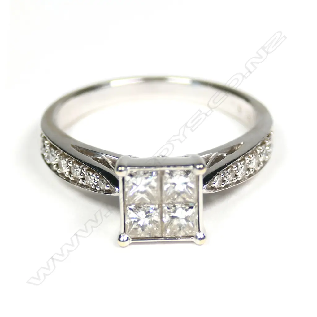 An 18ct white gold and diamond dress ring Image 1++