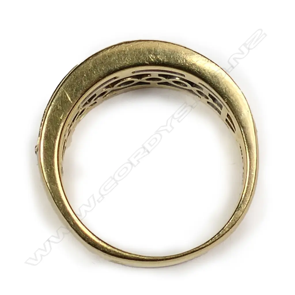 An 18ct multi diamond channel set ring Image 1++