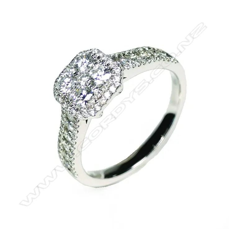 An 18ct white gold diamond cluster ring Image 1++