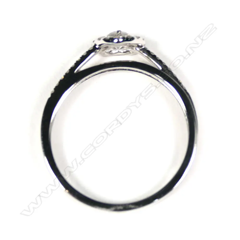 An 18ct white gold and diamond cluster ring Image 1++