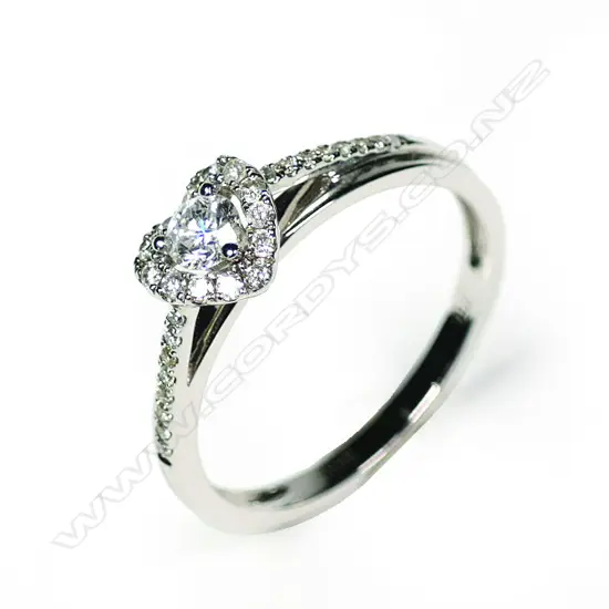 An 18ct white gold and diamond cluster ring