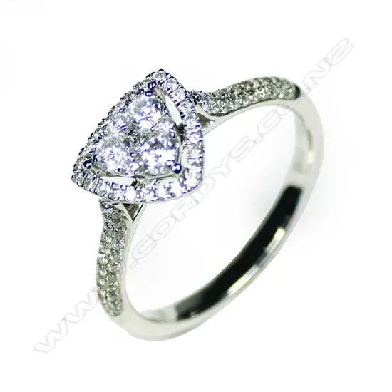 An 18ct white gold diamond cluster ring of triangular form