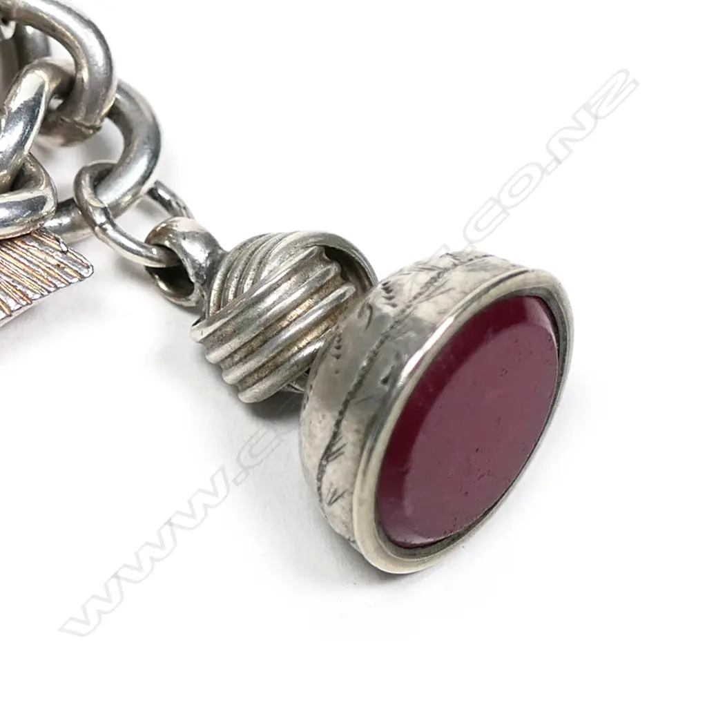 A vintage silver charm bracelet Image 1++