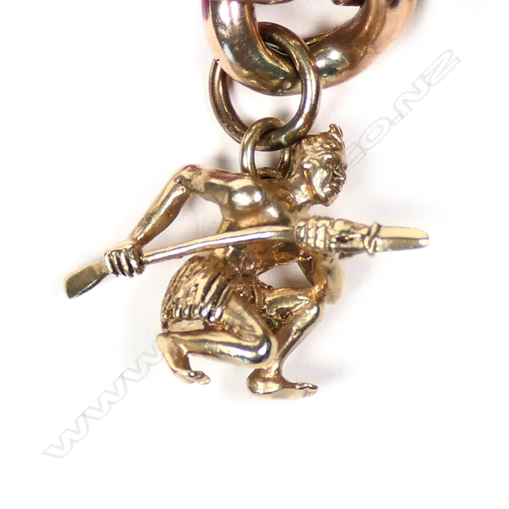 A vintage 9ct rose gold charm bracelet Image 1++