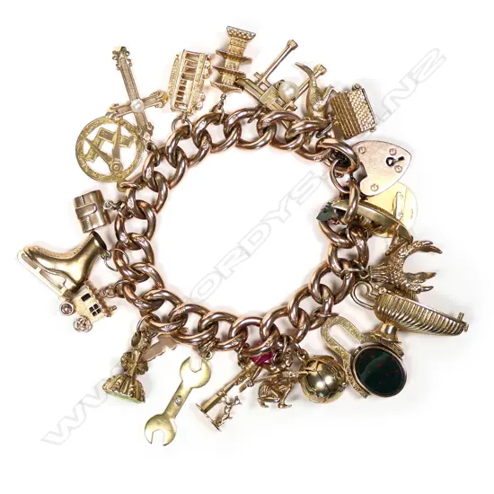 A vintage 9ct rose gold charm bracelet