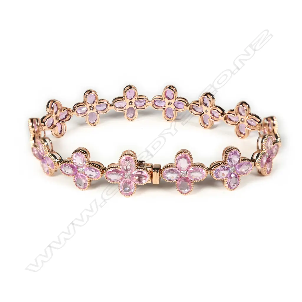 A 14ct rose gold sapphire and diamond vintage style bracelet Image 1++