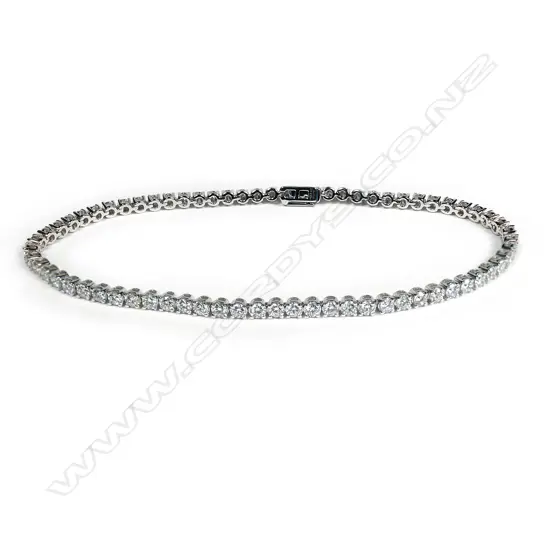 An 18ct white gold and diamond tennis bracelet