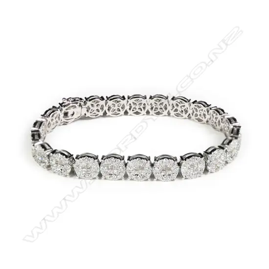 An 18ct gold and diamond multi cluster bracelet