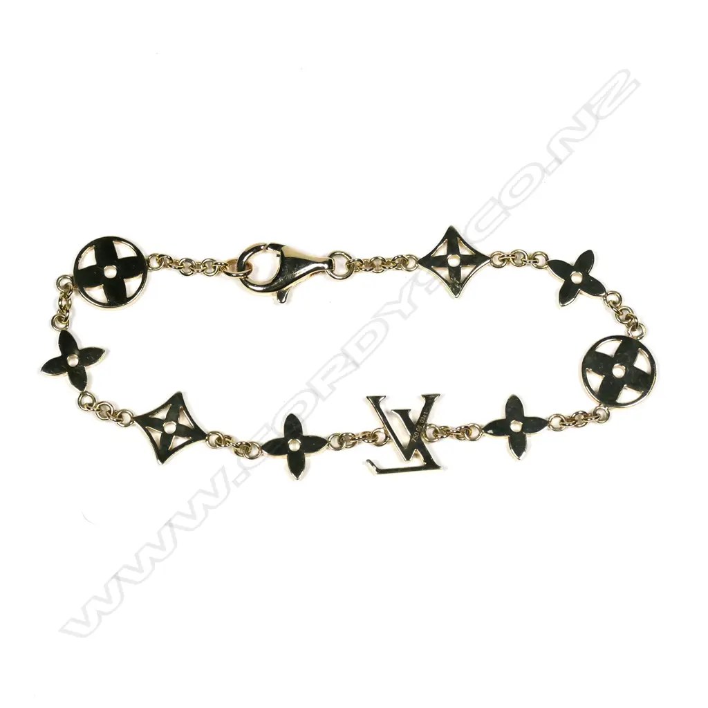 An 18ct yellow gold and diamond set designer bracelet Image 1++