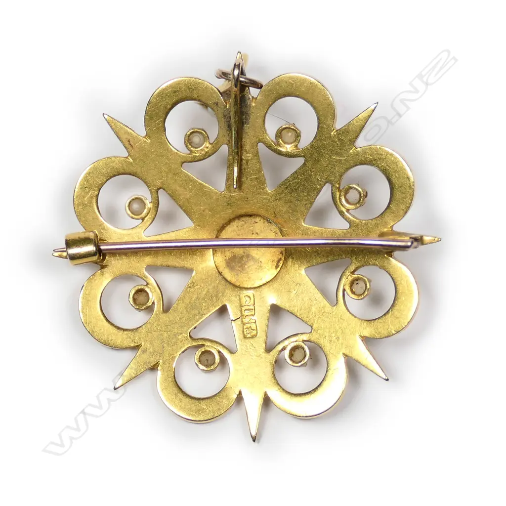 A good late Victorian 15ct yellow gold and seed pearl complex starburst pendant/brooch Image 1++