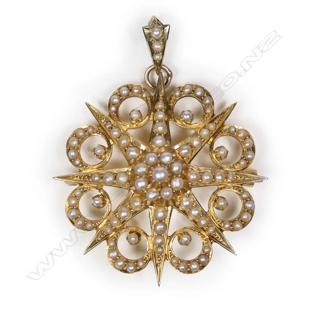 A good late Victorian 15ct yellow gold and seed pearl complex starburst pendant/brooch Image 1++